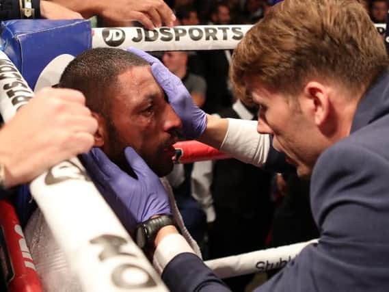 Kell Brook is examined by medical staff at the O2 Arena.Pic: PA