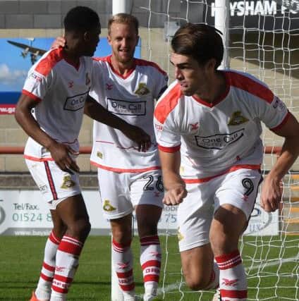 John Marquis celebrates his second goal.