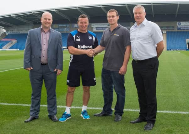 Chris Allsop (second from right) pictured with, from left to right: Richard Nichols, Spireites manager Danny Wilson & Spireites chief executive Chris Turner. (Pic: Tina Jenner)