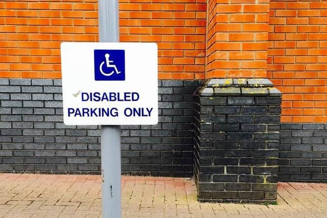 Sign of the times as disabled bays abused