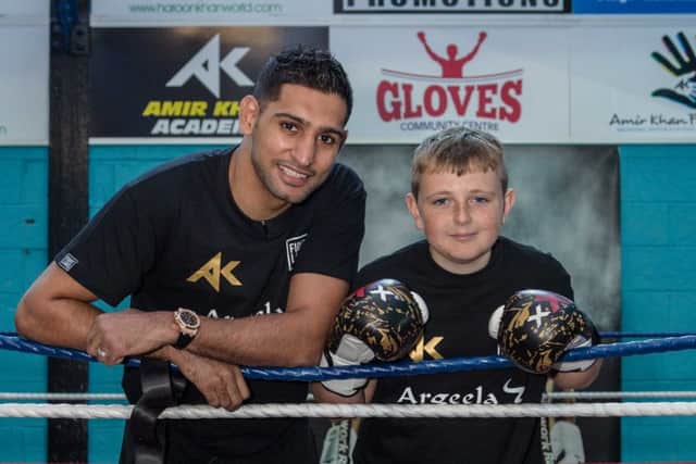 AMIR KHAN GIVES TEEN CANCER SURVIVOR AND ASPIRING BOXER SURPRISE OF HIS LIFE WHEN HE JOINS HIM IN THE RING