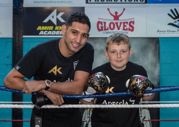 AMIR KHAN GIVES TEEN CANCER SURVIVOR AND ASPIRING BOXER SURPRISE OF HIS LIFE WHEN HE JOINS HIM IN THE RING
