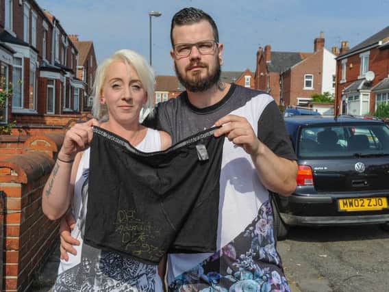 Abbie and Paul Bowman with the Primark pants with the mysterious gold message.