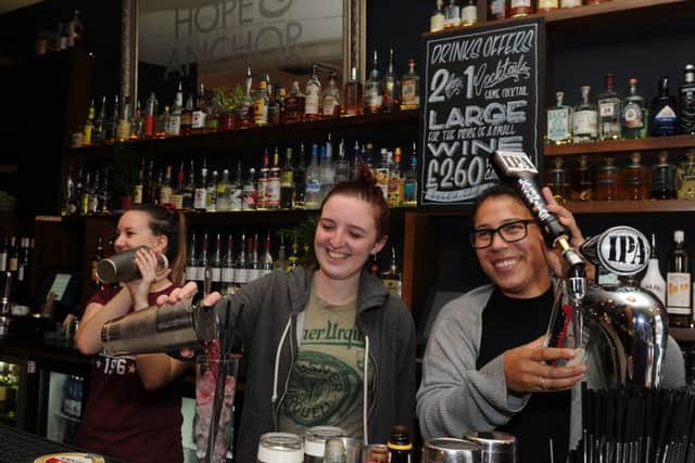 (l-r) Staff Zoe Burgess, Tania Mcwha and Derrin Rainstrick at the Hope and Anchor, West One. Picture: Andrew Roe