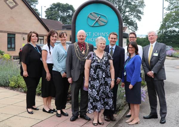 Doncaster St John's Hospice staff are pictured at the open day together with Civic Mayor of Doncaster, Cllr David Nevett (4th from left); Dr David Crichton, of Doncaster CCG (6th from left) and far right Lawson Pater, Chairman of RDaSH.