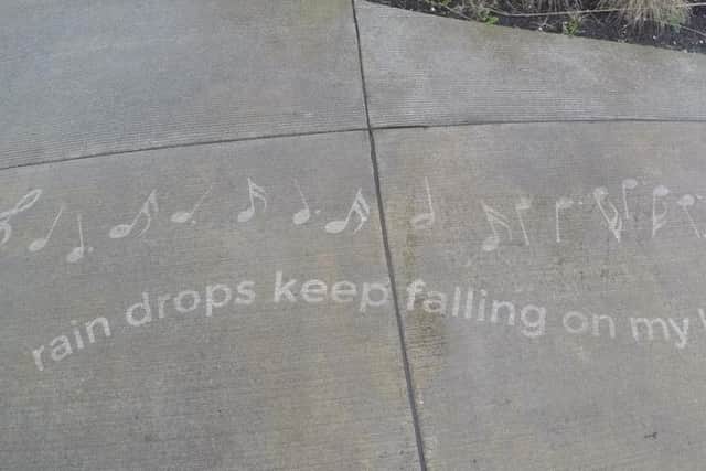 Rain drops keep falling on my head,,,,Rainworks by American street artist Peregrine Church