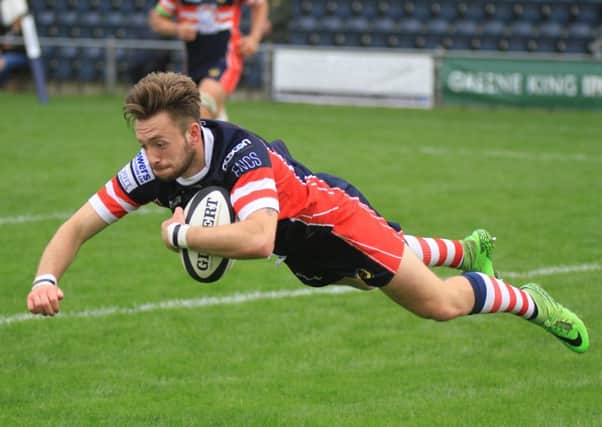 James Wright gets the third of his three tries against Stockport. Photo: FSP Images