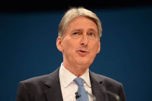 Chancellor of the Exchequer Philip Hammond speaks on the second day of the Conservative party conference at the ICC in Birmingham. PRESS ASSOCIATION Photo. Picture date: Monday October 3, 2016. See PA story TORY Main. Photo credit should read: Stefan Rousseau/PA Wire