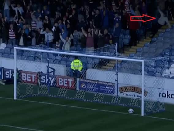 The Rovers fan takes a tumble at Portsmouth. (Photo: YouTube).