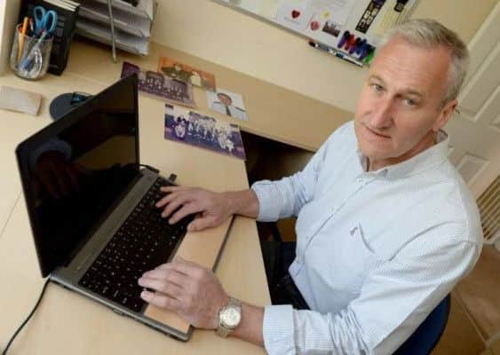 Michael Fowler at his desk.