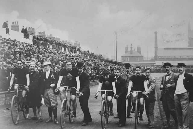 The start of the 1897 one-mile professional race, watched by crowds of spectators