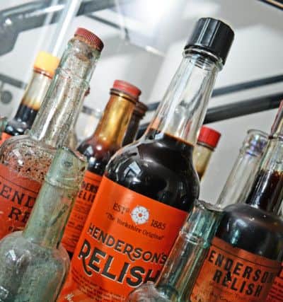 The most recent bottled Henderson's Relish, pictured with a bottle from thirty years ago and some of the 100 year-old bottles. Picture: Marie Caley NSST Hendersons MC 5