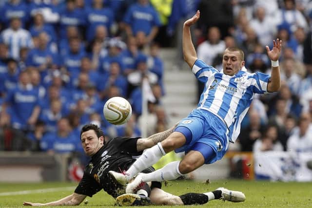 Jack Hunt in action for Huddersfield Town during the npower League One Play-Off Final at Old Trafford in 2011