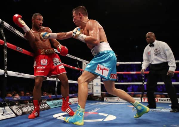 Gennady Golovkin (centre) and Kell Brook during the WBC, IBF and IBO World Middleweight title bout at The O2 Arena,