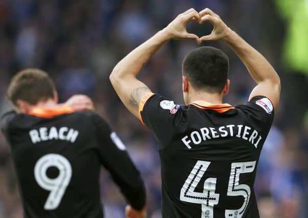 Fernando Forestieri of Sheffield Wednesday celebrates scoring he first goal during the Championship match at the John Smith's Stadium, Huddersfield. Pic Simon Bellis/Sportimage
