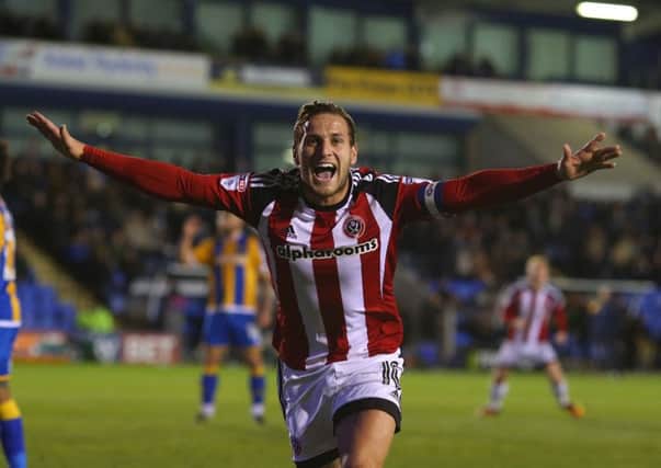 Billy Sharp of Sheffield Utd celebrates scoring the third goal during the English Football League One match at the Greenhous Meadow Stadium, Shrewsbury. Picture date: October 18th, 2016. Pic Simon Bellis/Sportimage