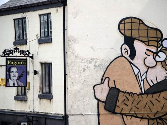 Pete McKee's work on the side of Fagan's Pub on Broad Lane. Photo by Will Roberts