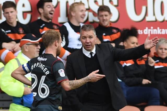 Darren Ferguson gives instructions to James Coppinger at Blackpool