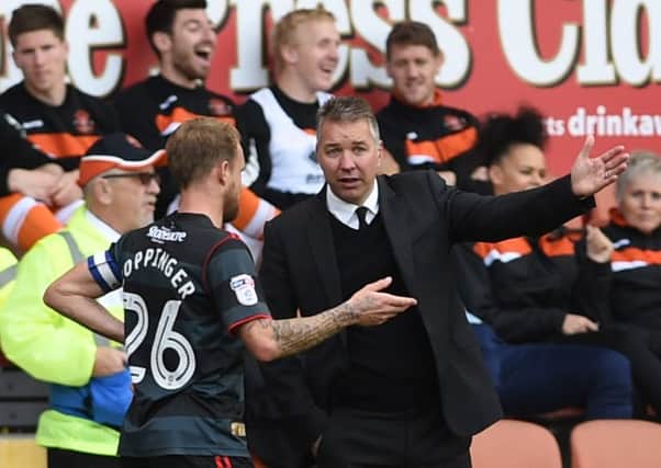 Darren Ferguson gives instructions to James Coppinger at Blackpool