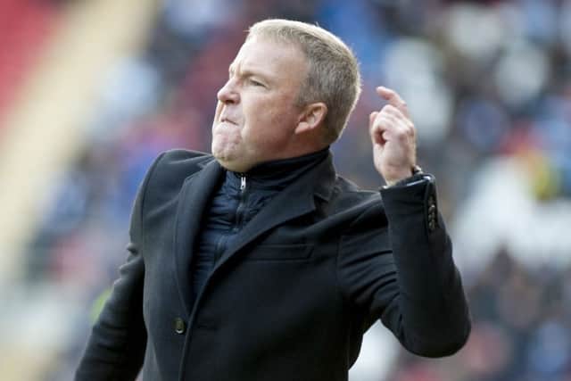 Kenny Jackett takes charge of his first game