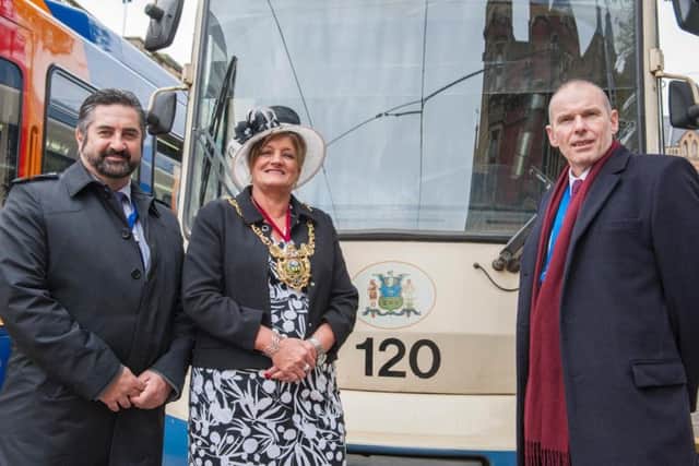 The 120th Lord Mayor poses with the 120 tram alongside Stagecoach Supertram Commercial Manager, Nigel Wragg (left), and executive director of SYPTE, Stephen Edwards (right)