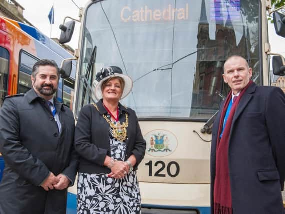 The 120th Lord Mayor poses with the 120 tram alongside Stagecoach Supertram Commercial Manager, Nigel Wragg (left), and executive director of SYPTE, Stephen Edwards (right)