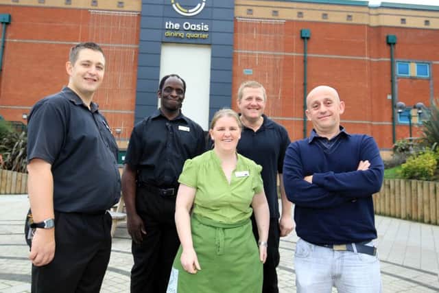 Meadowhall staff who say #DisabilityWorks. From left: Nathan Straw, Wayne Duncan, Rianna Barker, Ben Mellors, and Dean Ryan.