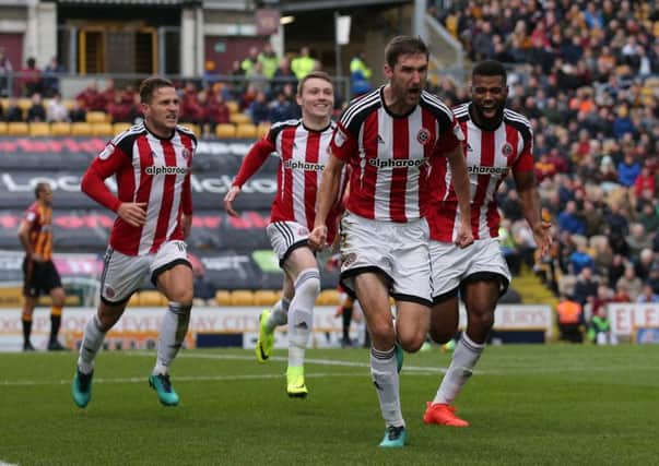 Chris Basham (front) says there are no untouchables in Sheffield United's first team squad. Pic Simon Bellis/Sportimage