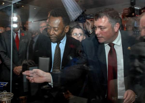Brazilian legend Pele and Richard Tims, chairman of Sheffield FC, officially opening a display on the 150th anniversary of Club in 2007