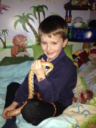 Jack with his pet snake Keith, which went missing in June