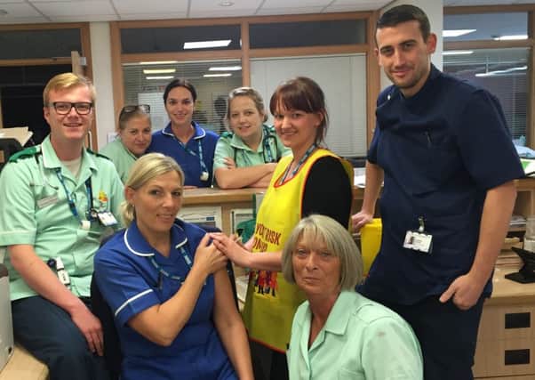 Assessment Treatment Centre team at Bassetlaw Hospital some of the 75 percengt vaccinated against flu