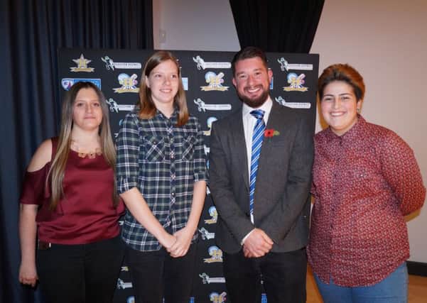 Chesterfield Ladies FC chairman Keith Jackson with Heritage High footballers Abbie Kent, Eve Bennett and Carly Marsden