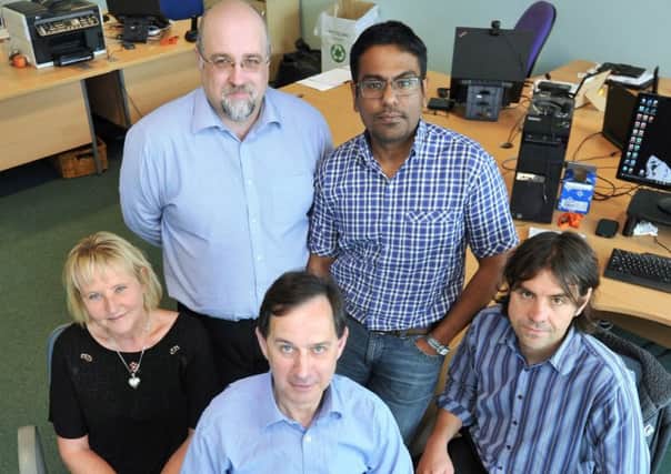 Nick Kitchin, Founder and CEO of Cumulus (centre) and the Cumulus EnergyStorage team. Credit Roger Moody.