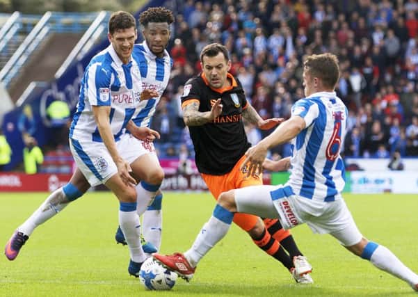 Ross Wallace skips through challenges at Hudderfield