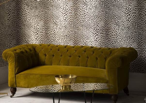 Leopard print, beige, wallpaper, Â£20 a roll, available from Graham and Brown. Picture credit: PA Photo/Handout.