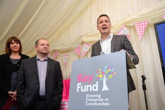 Key Fund CEO Matt Smith announcing 10m of new funds to invest in community and social enterprises at its new offices in Sheffield. Looking on is Andy Simpson of Doncaster Refurnish centre and Nic Greenan of East Street Arts. Photo: Antony Oxley