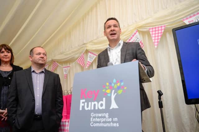 Key Fund CEO Matt Smith announcing 10m of new funds to invest in community and social enterprises at its new offices in Sheffield. Looking on is Andy Simpson of Doncaster Refurnish centre and Nic Greenan of East Street Arts. Photo: Antony Oxley