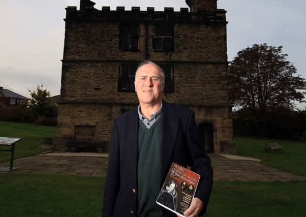 Historian David Templeman with his new book about Mary Queen of Scots pictured at Manor Lodge in Sheffield. Picture: Chris Etchells