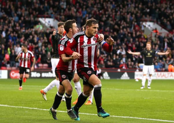 Billy Sharp celebrates what would be the winner against MK Dons