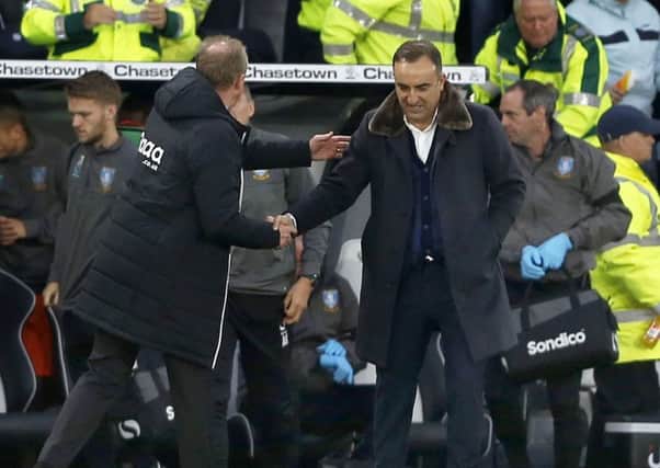 Rival Managers at the final whistle Countys Steve McLaren with Owls Carlos Carvalhal