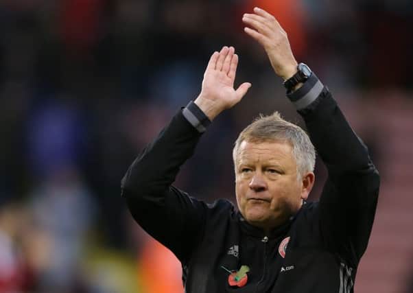 Chris Wilder manager of Sheffield Utd applauds the fans after the MK Dons win