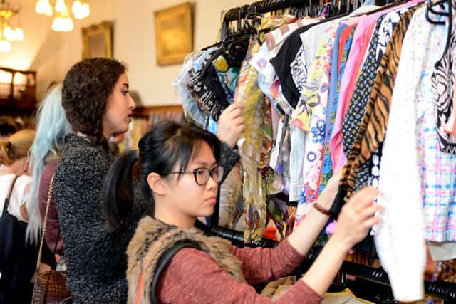 Lou Lou's vintage fair attracted a big crowd to Sheffield town hall on Saturday (27 Sepember 2014). Our picture shows shoppers looking for a bargain.