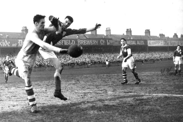 Young Spireites centre-forward Bobby Raine launches into a challenge on the Yeovil keeper that has the appearance of being filed under enthusiastic rather than accurate' in the FA Cup in 1950