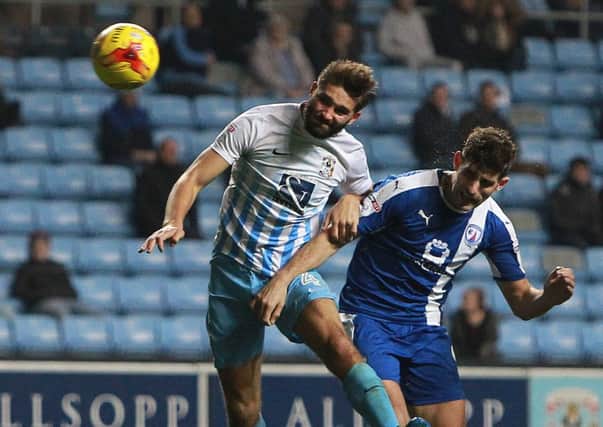 Picture by Gareth Williams/AHPIX.com. Football, Sky Bet League One; 
Coventry City v Chesterfield; 01/11/2016 KO 7.45pm;  
Ricoh Arena;
copyright picture;Howard Roe/AHPIX.com
Chesterfield's Ched Evans beats Coventry's Jordan Turnbull to the ball but heads just wide
