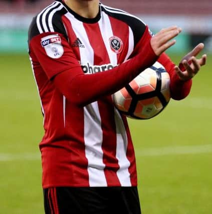 Harry Chapman of Sheffield Utd walks off with the match ball. Pic Simon Bellis/Sportimage