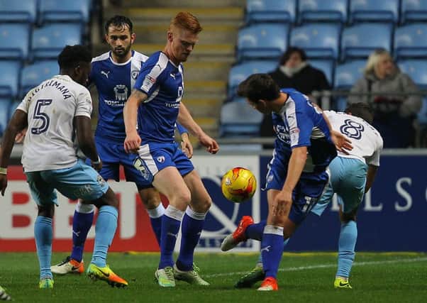Picture by Gareth Williams/AHPIX.com. Football, Sky Bet League One; 
Coventry City v Chesterfield; 01/11/2016 KO 7.45pm;  
Ricoh Arena;
copyright picture;Howard Roe/AHPIX.com
Spirites Liam O'Neill tries to help out Connor Dimaio in a challenge with Coventry's Ruben Lameiras