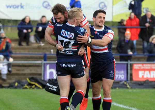 Knights player Sean Scanlon celebrates after scoring a try. Picture: Chris Etchells