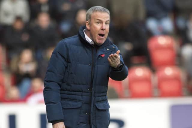 Kenny Jackett gives out instructions