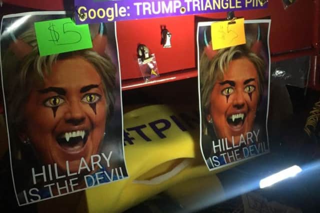Posters claiming Hillary Clinton is the devil were on sale outside