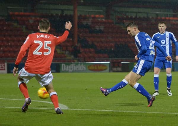 Jay O'Shea puts the Spireites into the lead. Picture by Howard Roe/AHPIX.com